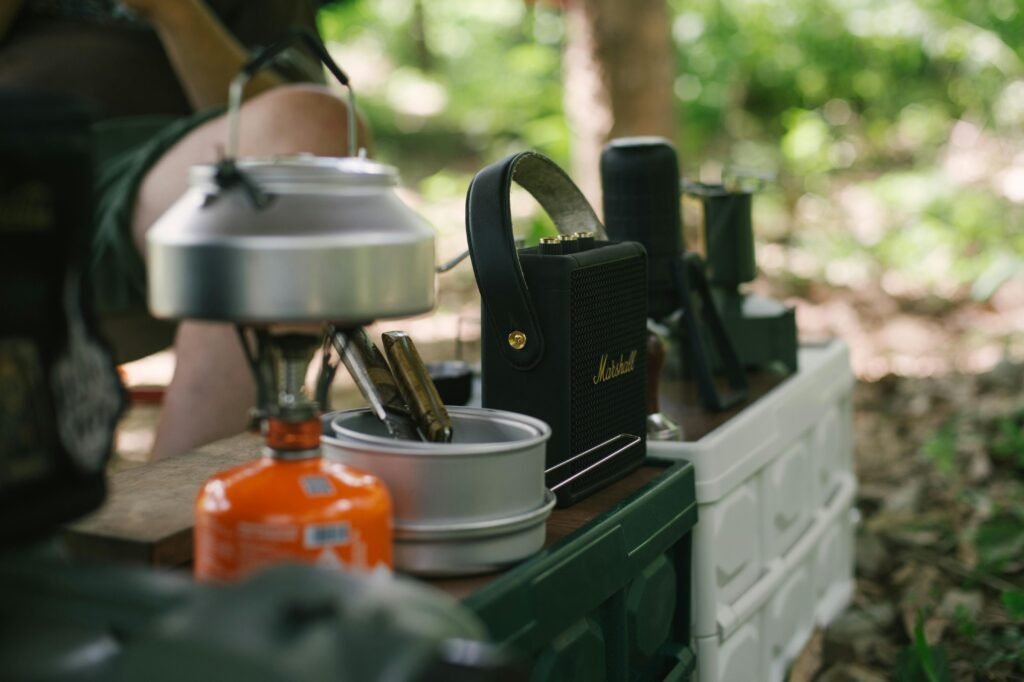 Portable propane oven baking delicious food outdoors, ideal for versatile camping and backyard culinary adventures.