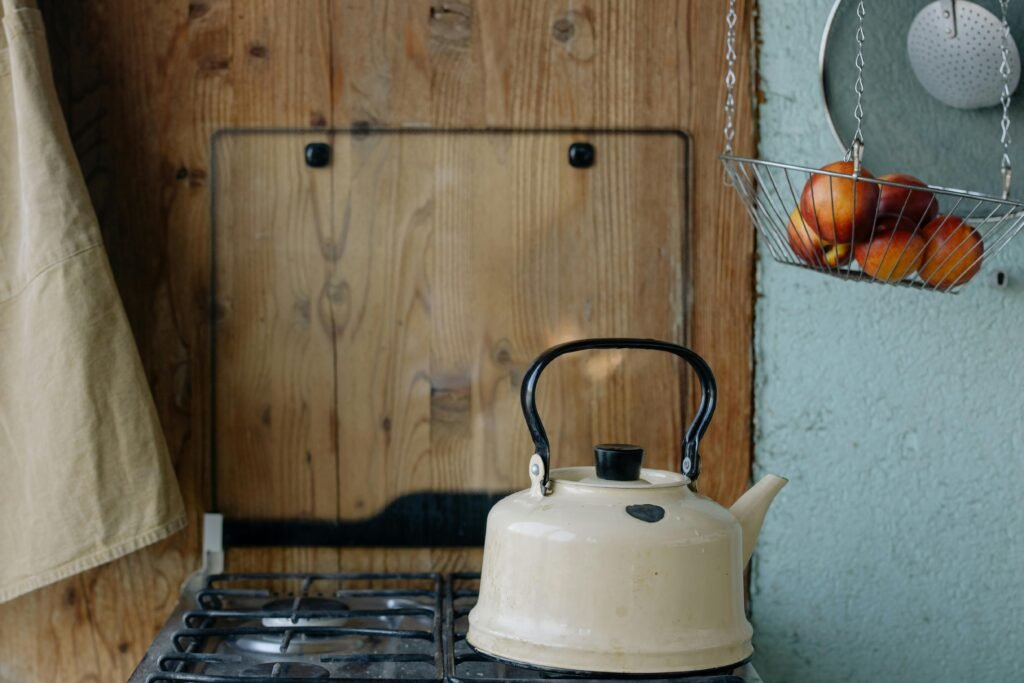 A warm and inviting image of a versatile cook stove in action, preparing a comforting meal, symbolizing the essential role of a reliable stove for home cooking, outdoor adventures, and self-sufficiency.